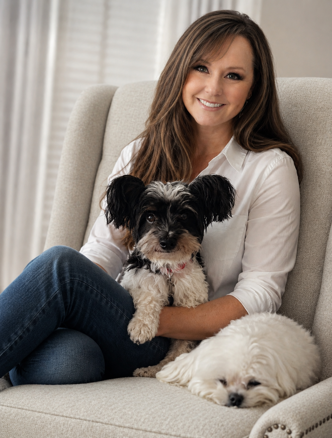 Kerri at home with her dogs Daisy and Piper